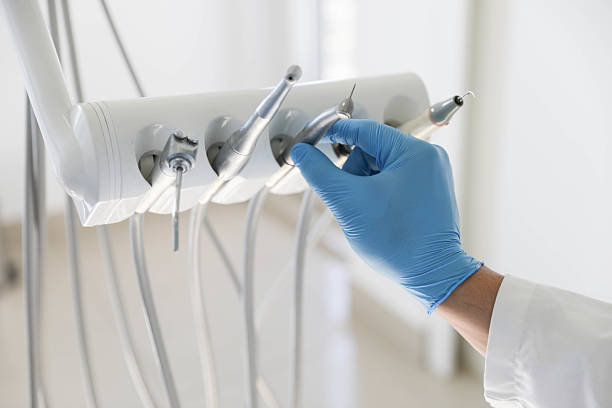 Professional Tooth Extraction technician working in Hamilton Square, NJ